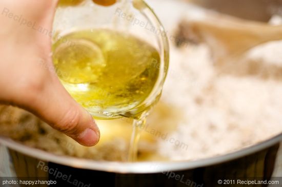 pour in the canola or olive oil,
