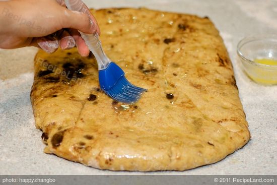 Roll the dough into an 18-inch x 9-inch rectangle.