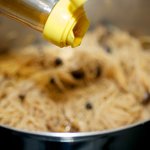 Remove the pot from the heat, drizzle the sesame oil,