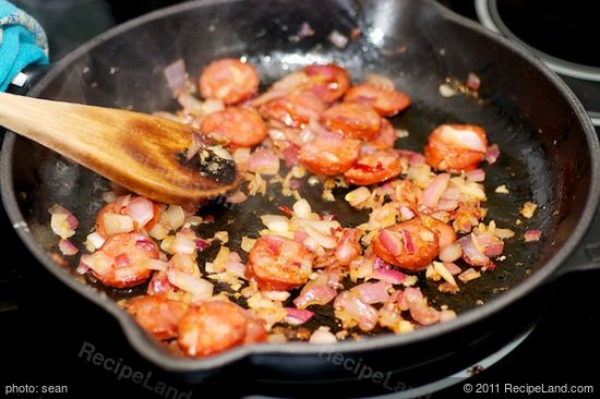 Stir in the onions, garlic, chorizo and chili and cook until the onions are softened about 4 minutes. 