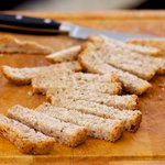 Using a bread knife cut the bread into 1-inch slices first.