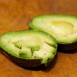 Finally half the avocado, slice the flesh into 1/2-inch cubes. 