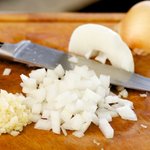Mince or finely chop the garlic, and chop up the onions.