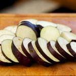 Slice eggplant into 1/2-inch slices.