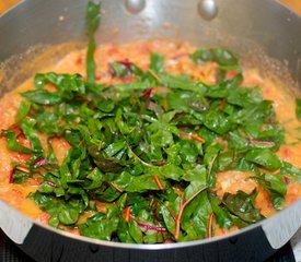 Salmon Poached with Tomatoes and Swiss Chard