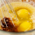 Add eggs and vanilla, and whisk or beat until well blended.