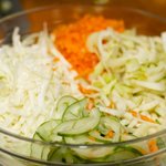Add all the prepared vegetables into a large mixing bowl.