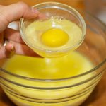 and the egg, whisk until well blended.