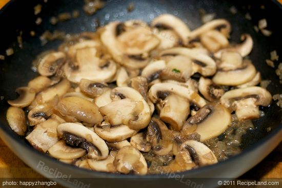 In a large skillet, melt the 1/4 cup butter.