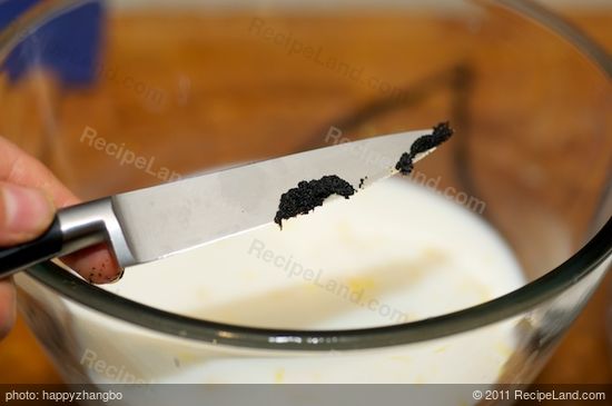 Using a paring knife scrapes all the seeds out of the vanilla pot, add into the bowl.