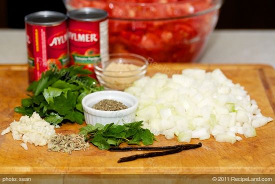 Get together the ingredients to make the tomato sauce first.