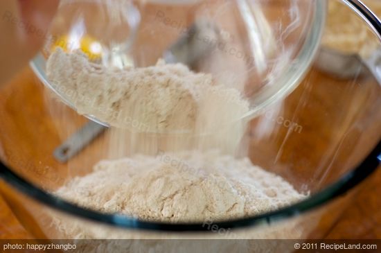 In a large bowl, add the yeast mixture, whole wheat and all-purpose flour.