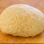 Use your hand to knead the dough a few times more until a soft ball forms.