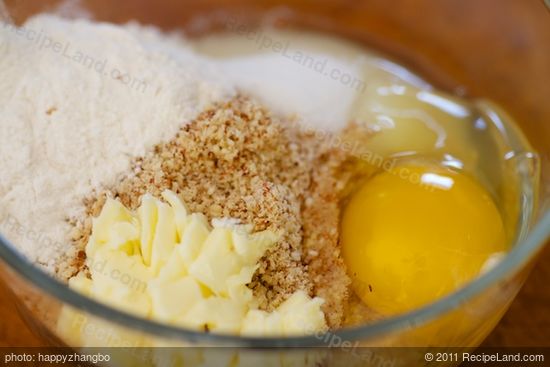 Add the ground almond, flour, butter, brown sugar and egg into a medium bowl. 