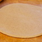 and roll out the dough into a 10-inch circle. 
