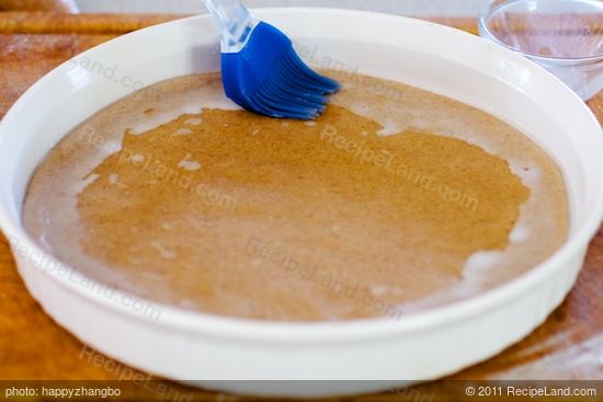 Brush the edges with extra milk, and sprinkle the sugar over the edges.
