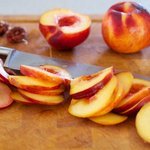 Half, core and slice the peaches or nectarines and plums into about 1/4-inch thick slices. Set aside. 