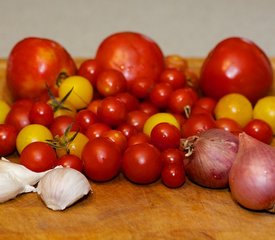 Warm Pasta with Roasted Tomatoes, Greens and Goat Cheese