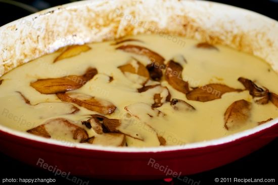 Immediately pour the batter around the edges and over the apples. 