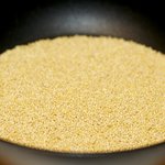 First toast the millet in a large nonstick skillet over medium heat.