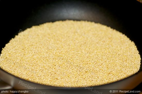 First toast the millet in a large nonstick skillet over medium heat.