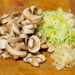 Get the mushrooms and scallions sliced, mince the garlic and ginger.