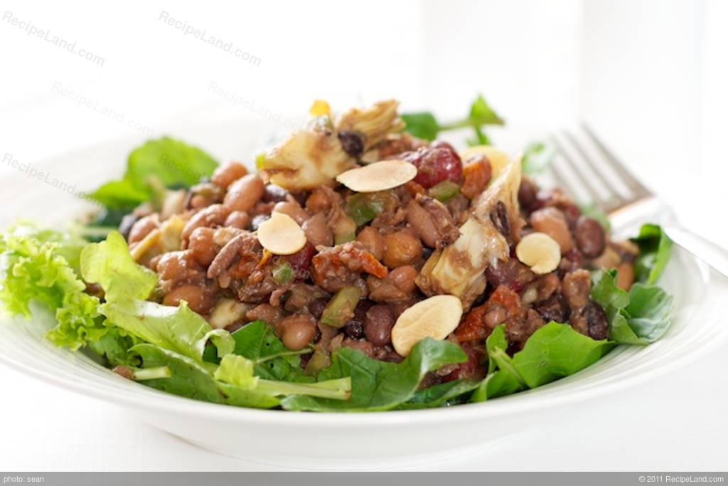 Five Bean, Artichoke and Sundried Tomato Salad with Greens and Toasted Almonds