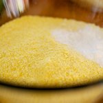 In another bowl, whisk together the cornmeal, baking soda and salt.