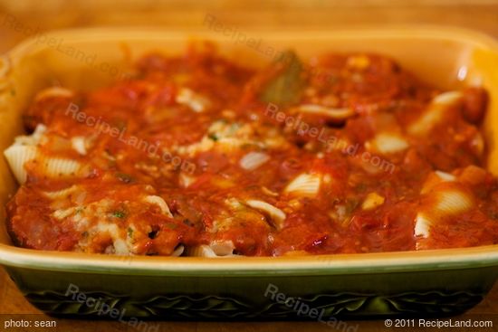 Pour remaining sauce over the stuffed shells