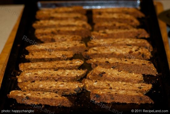 Arrange half of cookies cut side down on cookie sheet. 