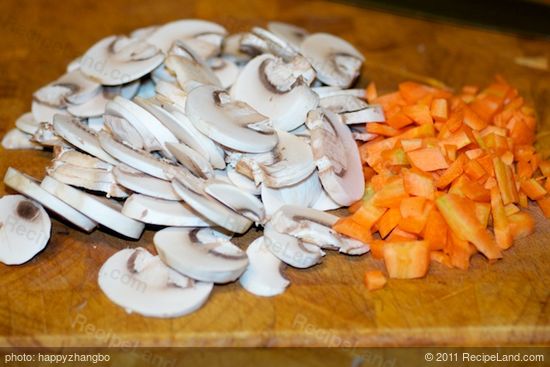 Slice the mushrooms and chop the carrot.