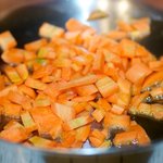 Add the carrots into a hot wok with a little oil,