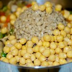 Add the garbanzo beans, barley, 