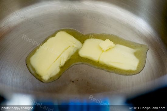 Melt butter in Dutch oven over high heat. 