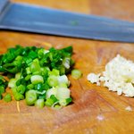 Chop the scallions and garlic if using.