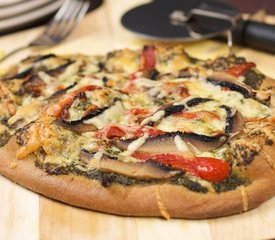 Basil Pesto, Roasted Pepper, Sun-dried Tomatoes and Portabella Mushrooms Pizza