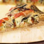 Basil Pesto, Roasted Pepper, Sun-dried Tomatoes and Portabella Mushrooms Pizza