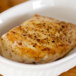 Remove the chicken breasts and arrange in a baking dish in a single layer. 