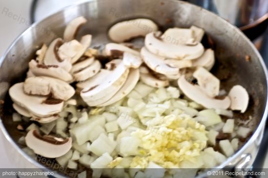 Add the onion, garlic and mushrooms.