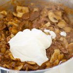Stir in sour cream; cook,