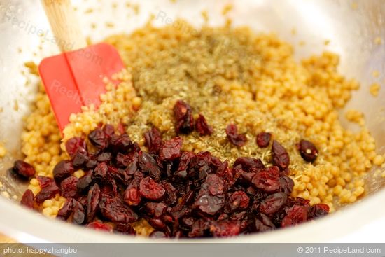 Transfer the cooked couscous to a large bowl 