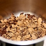 Next in a small saucepan, add the chopped chocolate chunks.