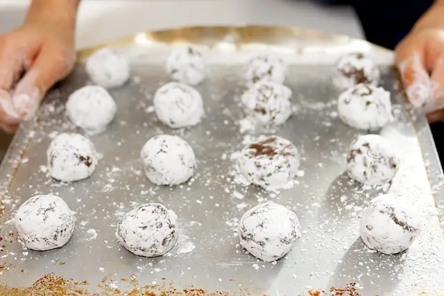 When the batter is ready, time to roll them into balls.