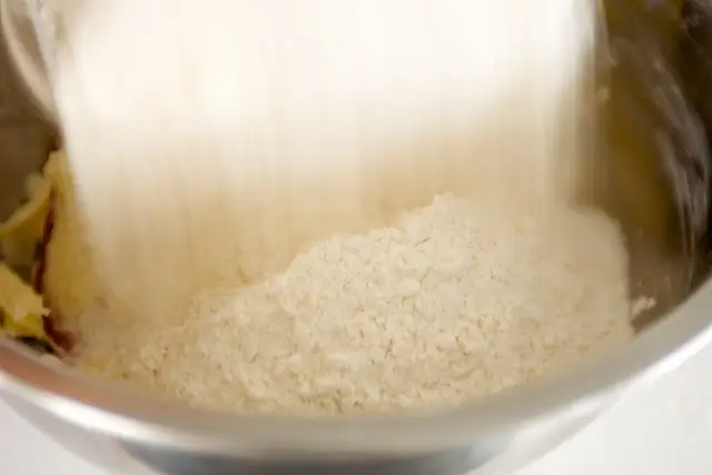 Add the flour and salt into the mixture.