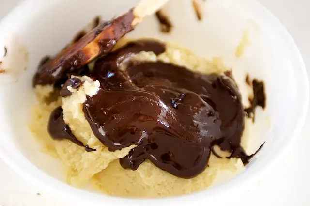 Pour the metled and cooled chocolate into the second part.