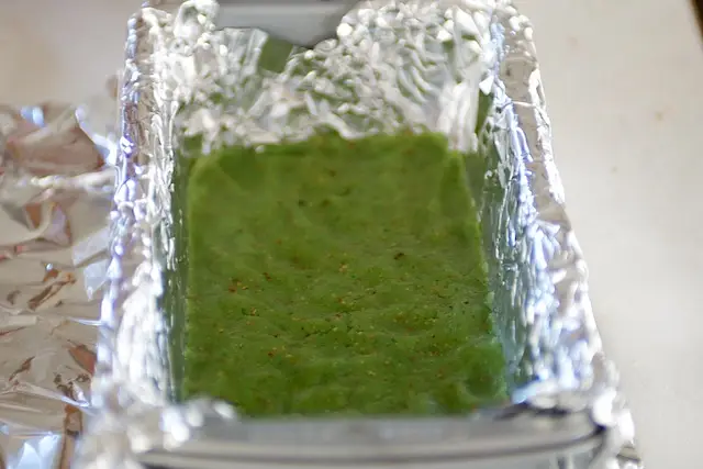 Press green nut dough evenly in bottom of pan.