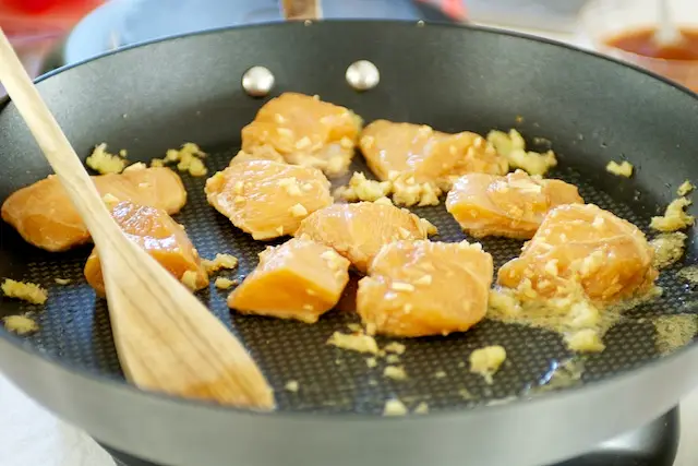 Carefully add the chicken mixture, spreading it out.  