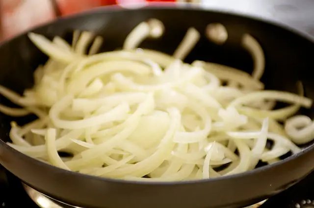 Add the onions to the skillet