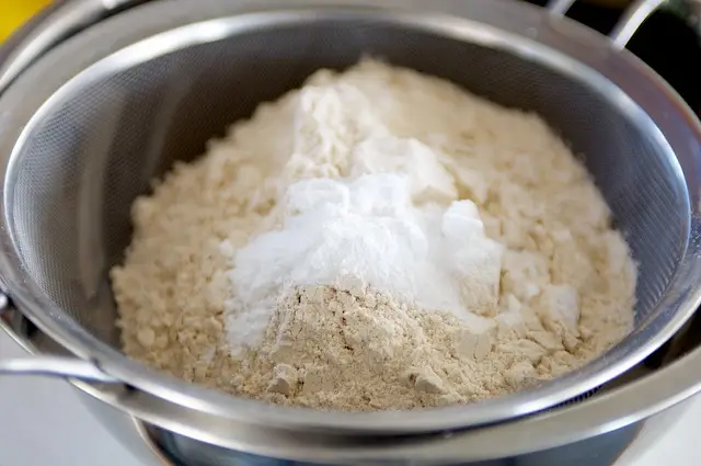 Sift together the flour, baking powder, baking soda, and salt in a large bowl. 