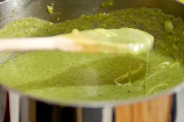 Simmer gently until cheese melts.